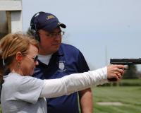 Person Holding a Gun