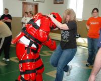 Person Practicing Self Defense with Knee Raised